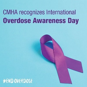 Blue box with purple ribbon saying "CMHA recognizes International Overdose Awareness Day"