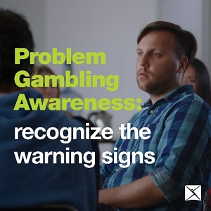 Box saying Problem Gambling Awareness: recognize the warning signs